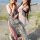 Two women together at ocean beach. Two women together at ocean beach. - PhotoDune Item for Sale