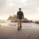 Young man walking on the beach Young man walking on the beach - PhotoDune Item for Sale
