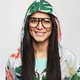 Pretty cheerful female model posing in hood and glasses Pretty cheerful female model posing in hood and glasses - PhotoDune Item for Sale