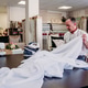 senior man working in atelier ironing curtains. Small business senior man working in atelier ironing curtains. Small business - PhotoDune Item for Sale
