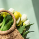Mothers Day Straw Bag with Colorful Tulips on Blue Background Mothers Day Straw Bag with Colorful Tulips on Blue Background - PhotoDune Item for Sale
