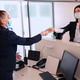 Passenger giving his documents for check-in to airport manager by counter Passenger giving his documents for check-in to airport manager by counter - PhotoDune Item for Sale