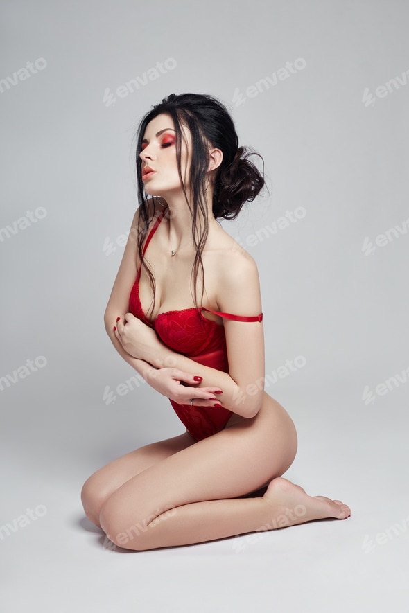 Woman in lingerie, confident strong sexy girl. Woman with beautiful Breasts sitting on the floor Stock Photo by IvaFoto Woman in lingerie, confident strong sexy girl. Woman with beautiful Breasts sitting on the floor Stock Photo by IvaFoto