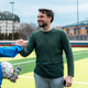 Two men shake hands on a soccer field after a game in the afternoon with clouds in the sky Two men shake hands on a soccer field after a game in the afternoon with clouds in the sky - PhotoDune Item for Sale