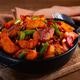 Steakhouse pfanne, fried potato slices, with meatballs, and vegetable mixture, on a black plate, Steakhouse pfanne, fried potato slices, with meatballs, and vegetable mixture, on a black plate, - PhotoDune Item for Sale