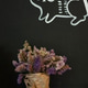 Vertical orientation image of flowers bouquet in front of black wall with drawing of an animal Vertical orientation image of flowers bouquet in front of black wall with drawing of an animal - PhotoDune Item for Sale