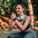 Woman exercising outdoors doing squats, enjoying healthy lifestyle Woman exercising outdoors doing squats, enjoying healthy lifestyle - PhotoDune Item for Sale