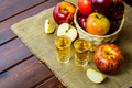 Apple brandy shots and red apples Apple brandy shots and red apples - PhotoDune Item for Sale