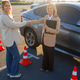 Driving Instructor Congratulating Learner Driver After Test Driving Instructor Congratulating Learner Driver After Test - PhotoDune Item for Sale