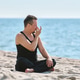 Adult man practicing pranayama yoga breathing on Baltic Sea beach Adult man practicing pranayama yoga breathing on Baltic Sea beach - PhotoDune Item for Sale