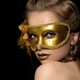 Young beautiful woman wearing golden party mask Young beautiful woman wearing golden party mask - PhotoDune Item for Sale