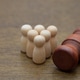 A group of figures observes a gavel, symbolizing class action, public hearings, or social justice. A group of figures observes a gavel, symbolizing class action, public hearings, or social justice. - PhotoDune Item for Sale