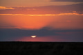 Dramatic sunset sky with dark clouds and red sun Dramatic sunset sky with dark clouds and red sun - PhotoDune Item for Sale