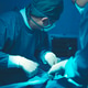 In a operating room, a doctor or medical team is performing a surgical procedure. In a operating room, a doctor or medical team is performing a surgical procedure. - PhotoDune Item for Sale