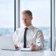 Busy professional businessman using laptop watching webinar working in office. Busy professional businessman using laptop watching webinar working in office. - PhotoDune Item for Sale