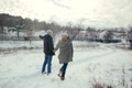 Cheerful young couple walking in a winter day Cheerful young couple walking in a winter day - PhotoDune Item for Sale