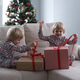 cute kids in Christmas pajamas with gift boxes at christmas morning cute kids in Christmas pajamas with gift boxes at christmas morning - PhotoDune Item for Sale