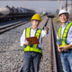 Railway Engineers Discussing Inspection Plan at Freight Yard Railway Engineers Discussing Inspection Plan at Freight Yard - PhotoDune Item for Sale