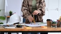 Professional architect woman working on project at modern office. Professional architect woman working on project at modern office. - PhotoDune Item for Sale