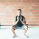 Fitness_man_doing_kettlebell_squat_exercise Fitness_man_doing_kettlebell_squat_exercise - PhotoDune Item for Sale