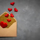 postcard, envelope with red heart inside, on grey concrete background postcard, envelope with red heart inside, on grey concrete background - PhotoDune Item for Sale