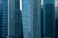 Modern skyscrapers covered with blue windows in the Central Business District of Singapore Modern skyscrapers covered with blue windows in the Central Business District of Singapore - PhotoDune Item for Sale