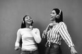 Young happy Latin girls having fun dancing and listening to music with wireless headphones Young happy Latin girls having fun dancing and listening to music with wireless headphones - PhotoDune Item for Sale