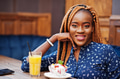 African woman in blue blouse African woman in blue blouse - PhotoDune Item for Sale