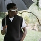 Stylish Black Man with Umbrella Enjoying Rainy Day Outdoors Stylish Black Man with Umbrella Enjoying Rainy Day Outdoors - PhotoDune Item for Sale
