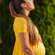Pregnant woman in yellow dress enjoying the outdoors on a calm sunny day Pregnant woman in yellow dress enjoying the outdoors on a calm sunny day - PhotoDune Item for Sale