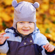 Little baby boy playing and smiling in the autumn park Little baby boy playing and smiling in the autumn park - PhotoDune Item for Sale
