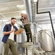 men with clipboard at brewery or beer plant men with clipboard at brewery or beer plant - PhotoDune Item for Sale