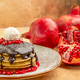 Front view (pancake) decorated with melted chocolate coconut powder pomegranate seeds and raffaell Front view (pancake) decorated with melted chocolate coconut powder pomegranate seeds and raffaell - PhotoDune Item for Sale