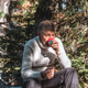 Picnic during the hike. The man is drinking tea or coffee from a thermos. Autumn travel. Close-up. Picnic during the hike. The man is drinking tea or coffee from a thermos. Autumn travel. Close-up. - PhotoDune Item for Sale
