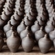 Rows of Clay Pots Drying Rows of Clay Pots Drying - PhotoDune Item for Sale