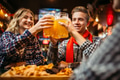 Football fans drinks beer in sports bar Football fans drinks beer in sports bar - PhotoDune Item for Sale