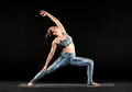 Young woman demonstrating a reverse warrior pose Young woman demonstrating a reverse warrior pose - PhotoDune Item for Sale