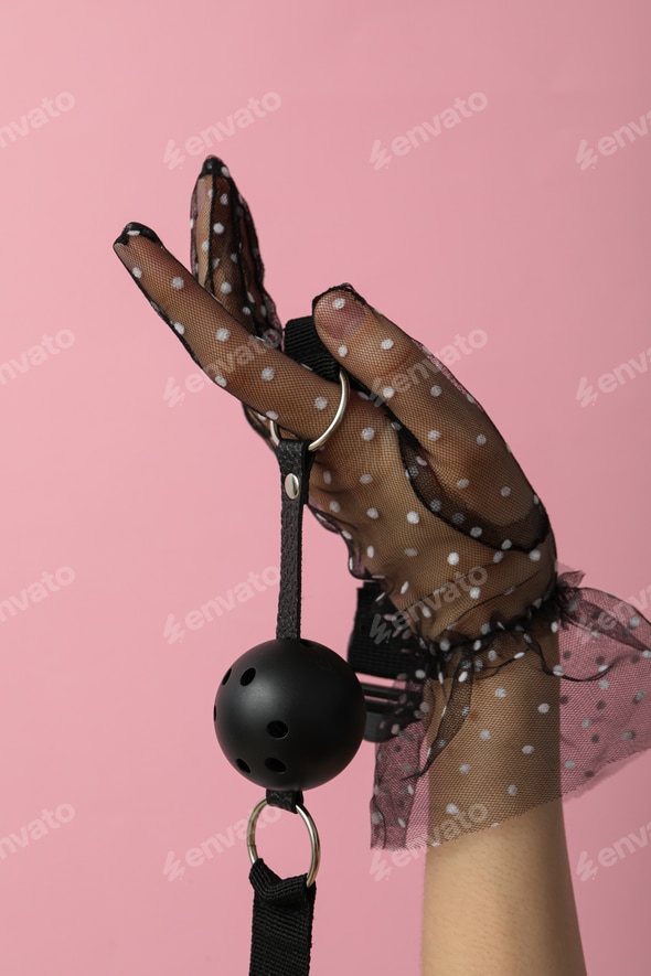 Sex toy gag in female hands in tulle gloves Stock Photo by AtlasComposer Sex toy gag in female hands in tulle gloves Stock Photo by AtlasComposer