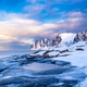 Tungeneset or Devils Jaw mountain on Senja island, Norway in winter. Tungeneset or Devils Jaw mountain on Senja island, Norway in winter. - PhotoDune Item for Sale