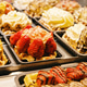 Filled Belgian waffles on display in a shop window. Filled Belgian waffles on display in a shop window. - PhotoDune Item for Sale