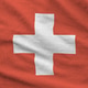Switzerland flag depicted on folded wavy fabric of old cloth Switzerland flag depicted on folded wavy fabric of old cloth - PhotoDune Item for Sale