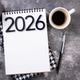 New year goals 2026 on desk. 2026 resolutions list with notebook, plant on table New year goals 2026 on desk. 2026 resolutions list with notebook, plant on table - PhotoDune Item for Sale