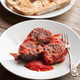 Burgos Blood Sausage Served With Tomato Sauce and Bread on a Rustic Table Burgos Blood Sausage Served With Tomato Sauce and Bread on a Rustic Table - PhotoDune Item for Sale