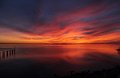Amazing sunset with gorgeous orange clouds reflected in the water. Nature’s beauty Amazing sunset with gorgeous orange clouds reflected in the water. Nature’s beauty - PhotoDune Item for Sale