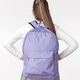 Young student with long ponytail and lilac backpack, view from back Young student with long ponytail and lilac backpack, view from back - PhotoDune Item for Sale
