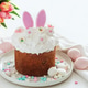 Easter Cake with Bunny Ears and Tulips. Festive Spring Composition Easter Cake with Bunny Ears and Tulips. Festive Spring Composition - PhotoDune Item for Sale