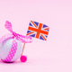 Golf ball with Union Jack Flag on Pink Background Golf ball with Union Jack Flag on Pink Background - PhotoDune Item for Sale