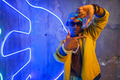 Black rapper in underpass neon light on background Black rapper in underpass neon light on background - PhotoDune Item for Sale
