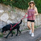 Adult woman walking with her dog Adult woman walking with her dog - PhotoDune Item for Sale