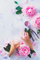 Minimal styled flatlay with peony flowers, petals, and waffle ice cream cones on a pastel background Minimal styled flatlay with peony flowers, petals, and waffle ice cream cones on a pastel background - PhotoDune Item for Sale